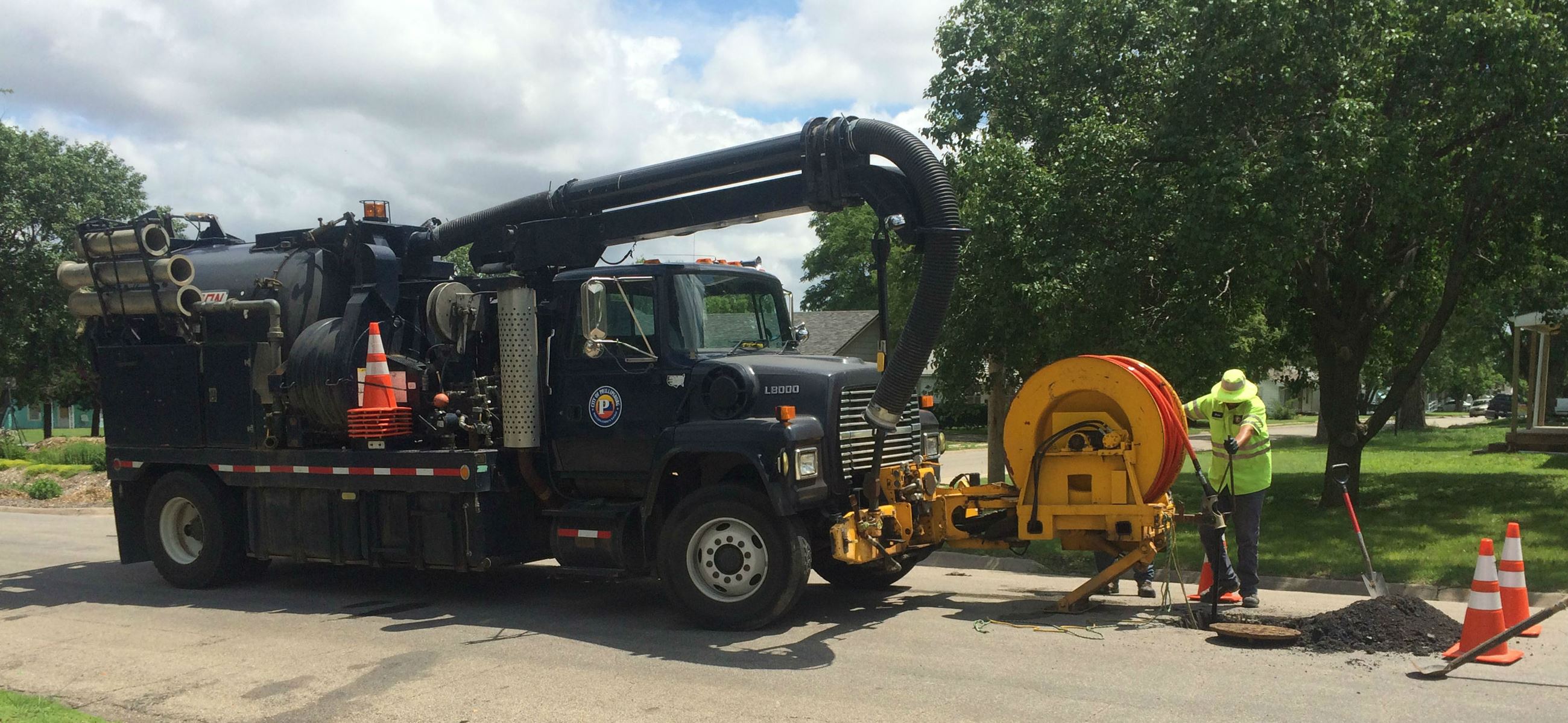 Hydro-flushing a wastewater line